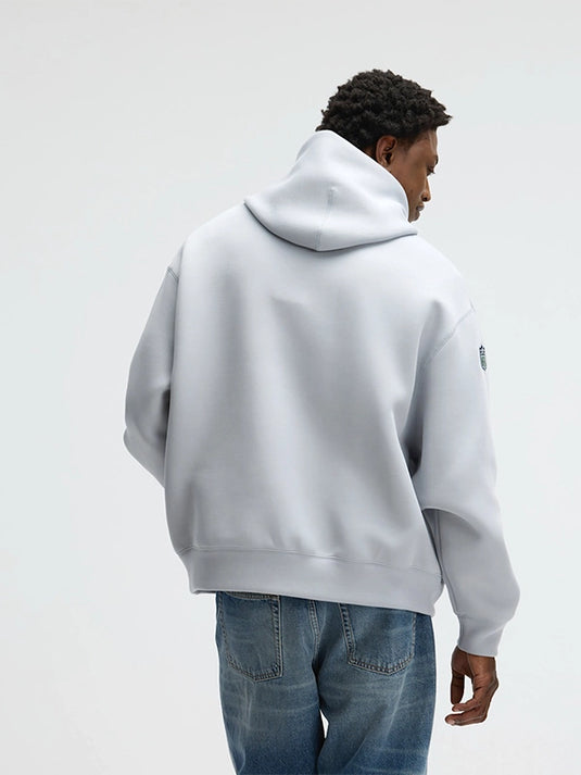 Oversized Nike tech fleece hoodie in grey from the 2025 Seattle Seahawks Rivalries series.