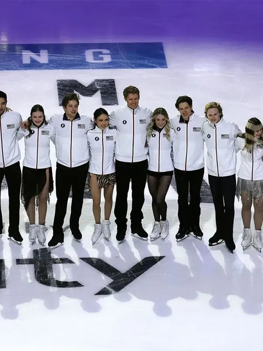 White Save The Duck Team USA figure skating jacket Milano Cortina 2026 styling with lightweight padding and refined athletic detailing