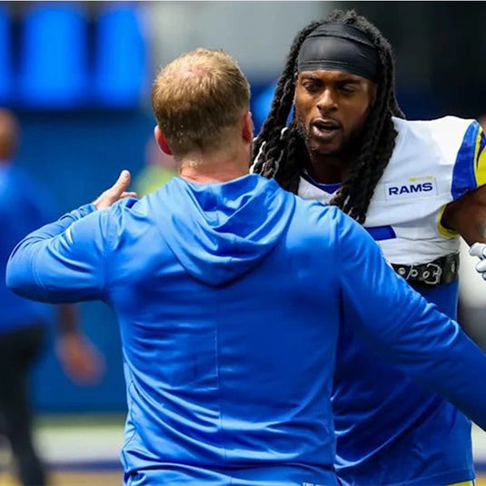 Blue LA Rams 2025 performance hoodie t-shirt reflecting Sean McVay’s sideline style.