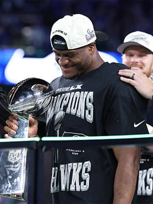 Seattle Seahawks Super Bowl LX 2026 Champions black T‑shirt with bold commemorative championship logo celebrating the title win