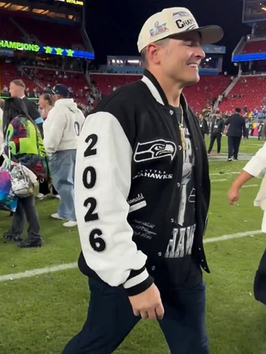 Black and white coaches varsity jacket inspired by the Seattle Seahawks’ Super Bowl LX title and Mike Macdonald leadership