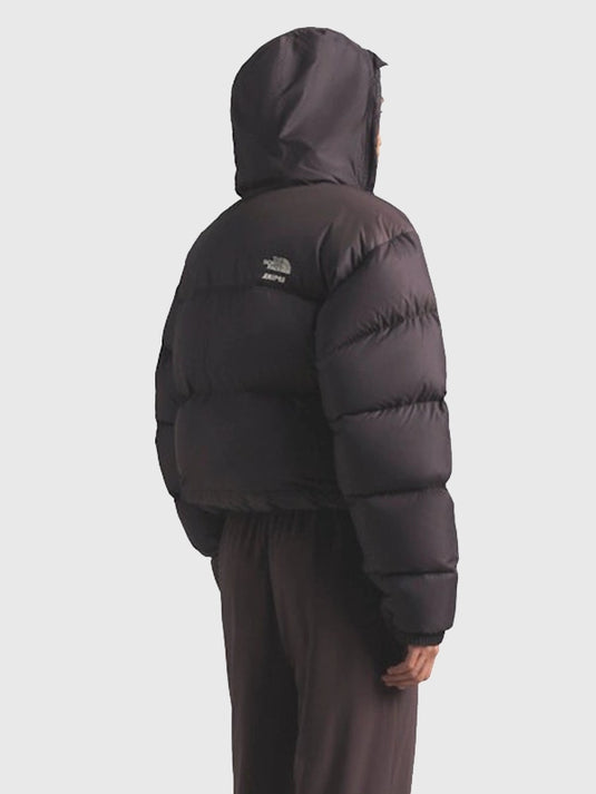 The North Face × SKIMS brown Nuptse parachute puffer jacket recreated with classic structured fit and lightweight construction.