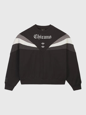Recreated Adidas x Willy Chavarria Chicano Crewneck 2.0 sweatshirt in black with bold front lettering and relaxed unisex fit