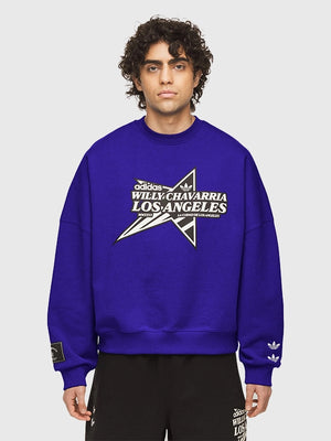 Unisex blue Adidas x Willy Chavarria Star Logo crewneck featuring ribbed collar, cuffs, and soft fleece interior