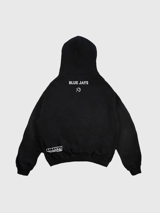 Black Toronto Blue Jays and The Weeknd 2025 Legacy Hoodie featuring World Series graphics and soft fleece fabric.