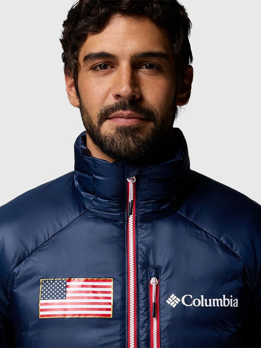 Navy down puffer jacket featuring Columbia craftsmanship and Milano Cortina 2026 Team USA detailing