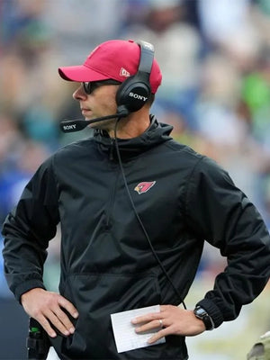 2025 Arizona Cardinals black half-zip hoodie jacket with coach-inspired sideline design for Jonathan Gannon.