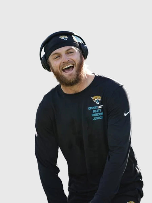 Jacksonville Jaguars Inspire Change 2025 black long sleeve shirt by Nike showcasing Opportunity Equity Freedom Justice design