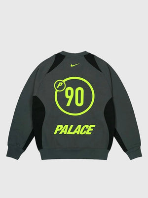 2025 Palace x Nike Total P90 sweatshirt in charcoal grey featuring soft fleece and refined co-branding.