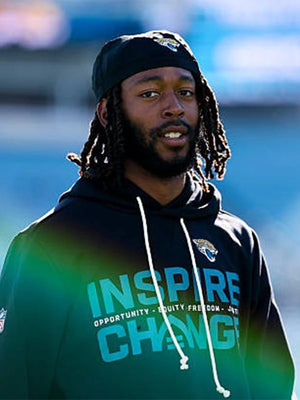 Black Nike sideline hoodie from the Jacksonville Jaguars 2025 Inspire Change collection with bold message text