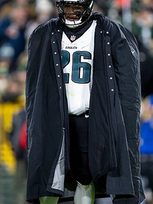 2025 Philadelphia Eagles Jalen Hurts sideline cape coat in black with sophisticated drape and premium material.