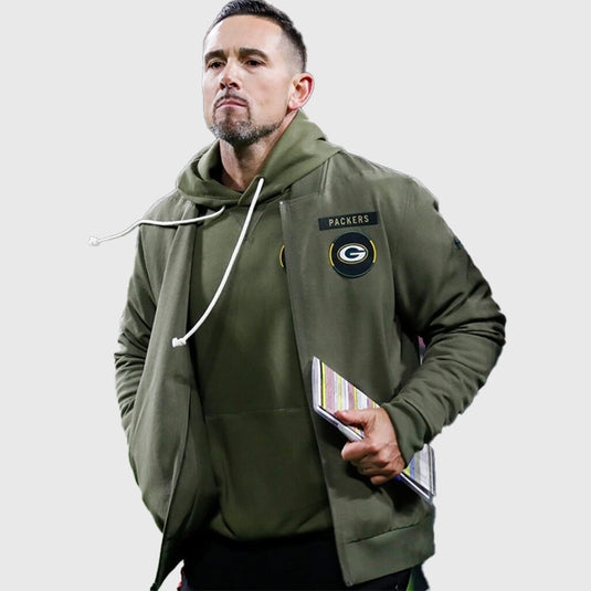 Olive green Salute to Service 2025 Green Bay Packers cotton bomber jacket combining durability with athletic sideline styling.