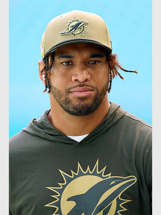 Tua Tagovailoa-inspired Dolphins Salute to Service sideline T-shirt in forest green with an athletic hooded fit.