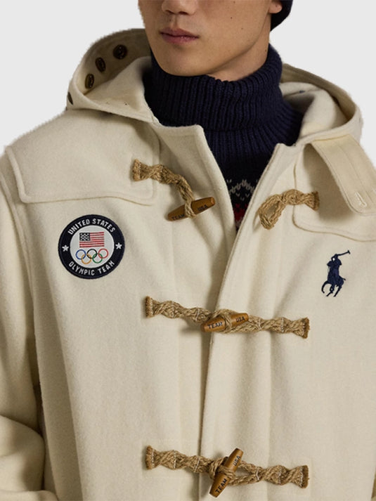 Milano Cortina 2026 themed cream Opening Ceremony toggle coat by Polo Ralph Lauren featuring traditional toggles and premium fabric