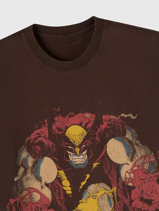 Recreated unisex brown OVO x Marvel 2025 Wolverine T-shirt featuring clean print detail and casual styling