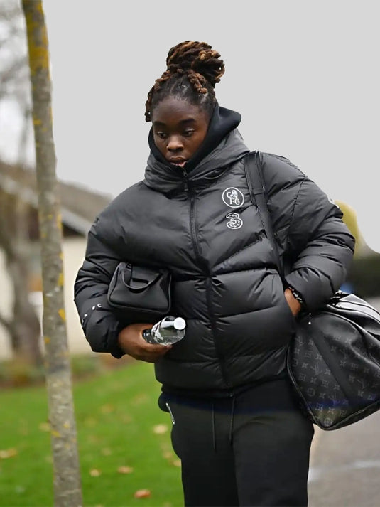 Chelsea FC–inspired 2025 Women’s Champions League puffer jacket in black with insulated hooded design