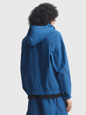 RECREATED Blue Adidas Z.N.E. 2026 Hooded Track Jacket crafted from smooth woven fabric with a sleek sporty profile