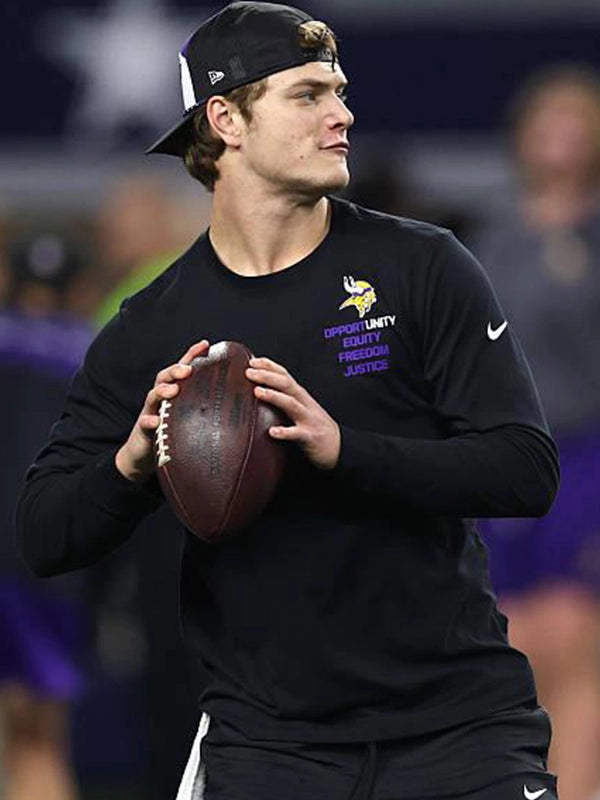 Minnesota Vikings J.J. McCarthy 2025 Inspire Change black Nike long sleeve T-shirt featuring Opportunity Equity Freedom Justice lettering