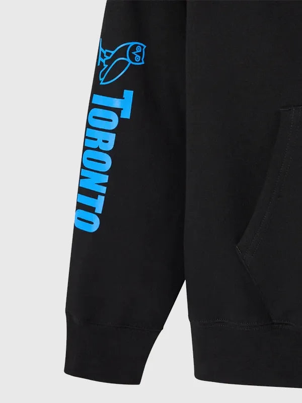 WWE OVO 2026 WrestleMania VI Hoodie with full-zip closure, ribbed trims, and statement graphic styling