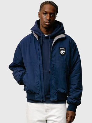 Recreated navy blue Stussy polar fleece lined jacket offering lightweight warmth and everyday layering versatility