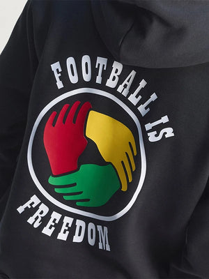 Black fleece pullover hoodie recreated under the Adidas x Bob Marley 2026 initiative with Football Is Freedom motif and relaxed unisex silhouette.