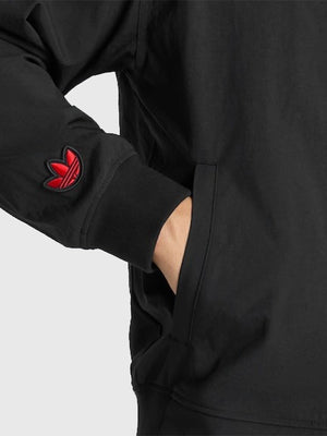 Black RECREATED Adidas Manchester United x Stone Roses 2026 jacket designed for unisex styling