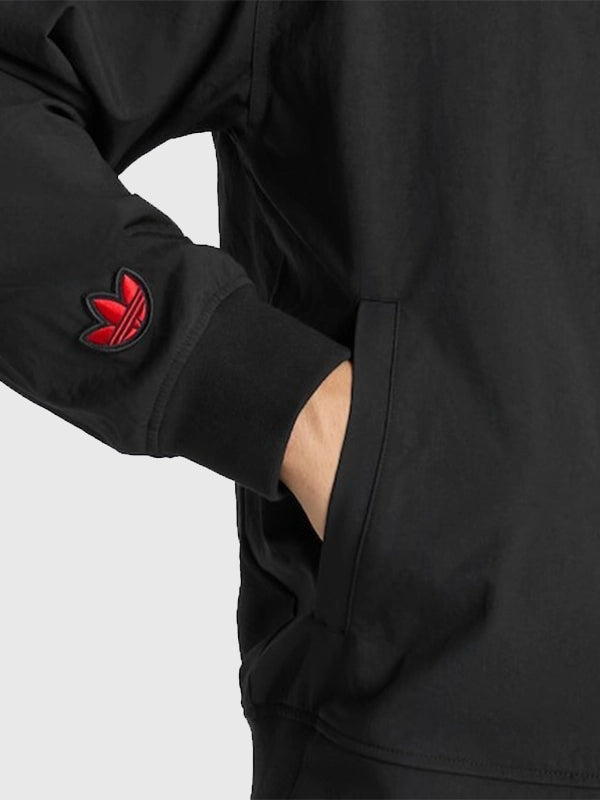 Black RECREATED Adidas Manchester United x Stone Roses 2026 jacket designed for unisex styling