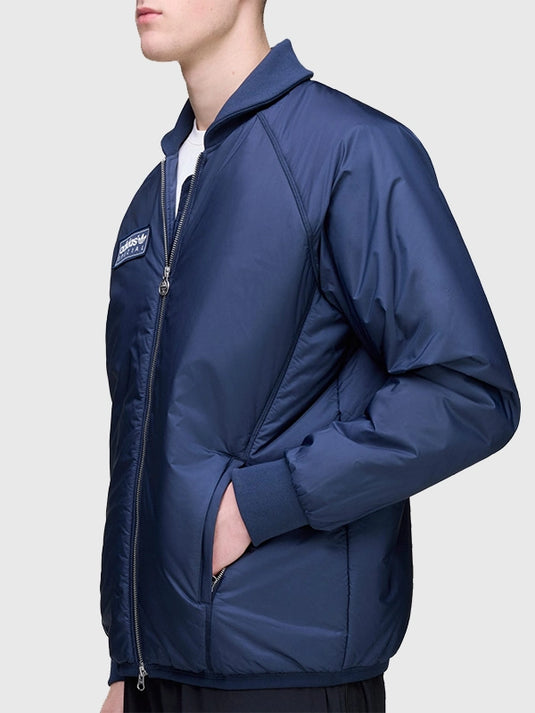 2025 Adidas Bramhope Spzl Blousson bomber jacket in blue with a lightweight build and signature Adidas detailing.