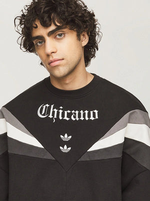 Recreated unisex black Chicano Crewneck 2.0 sweatshirt from Adidas x Willy Chavarria with durable fabric and oversized styling