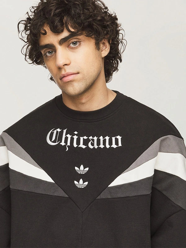 Recreated unisex black Chicano Crewneck 2.0 sweatshirt from Adidas x Willy Chavarria with durable fabric and oversized styling