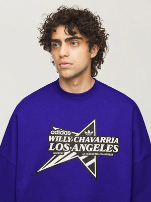 Recreated blue Star Logo crewneck sweatshirt from Adidas x Willy Chavarria with oversized silhouette and graphic chest print