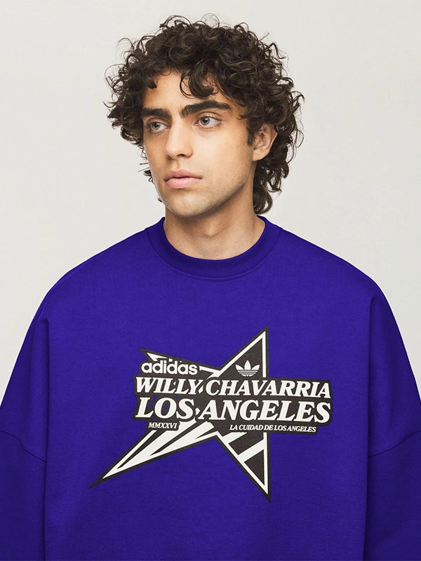 Recreated blue Star Logo crewneck sweatshirt from Adidas x Willy Chavarria with oversized silhouette and graphic chest print