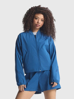 RECREATED Unisex Blue Adidas Z.N.E. 2026 Bomber Jacket designed with smooth fabric construction and a refined athletic look