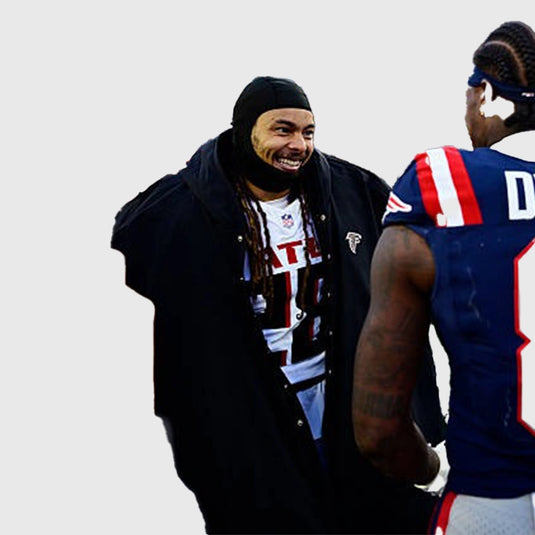 Stefon Diggs Atlanta Falcons Cape Coat offering modern sideline look with durable construction.