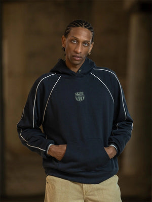 Recreated Barça Aftermatch Collection grey fleece hoodie with relaxed unisex fit and club‑inspired graphic