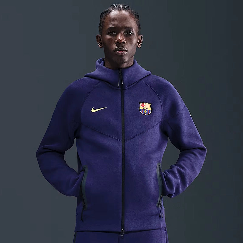Nike FC Barcelona Tech Windrunner hoodie featuring a sleek full-zip design and soft fleece fabric.