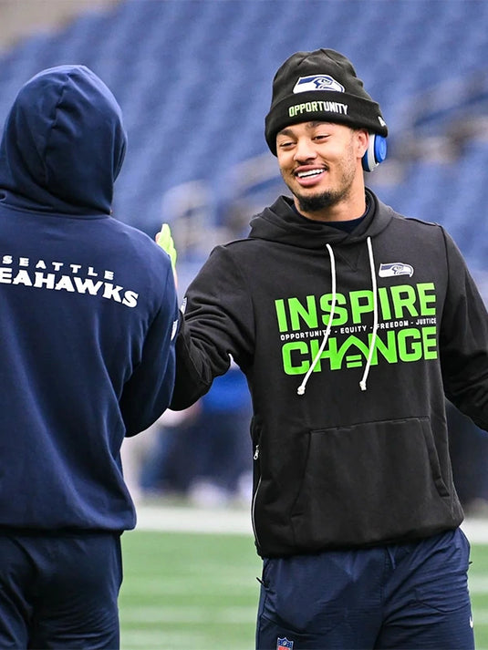 Seattle Seahawks 2025 Inspire Change Nike sideline hoodie inspired by Jaxon Smith-Njigba featuring Opportunity Equity Freedom Justice lettering