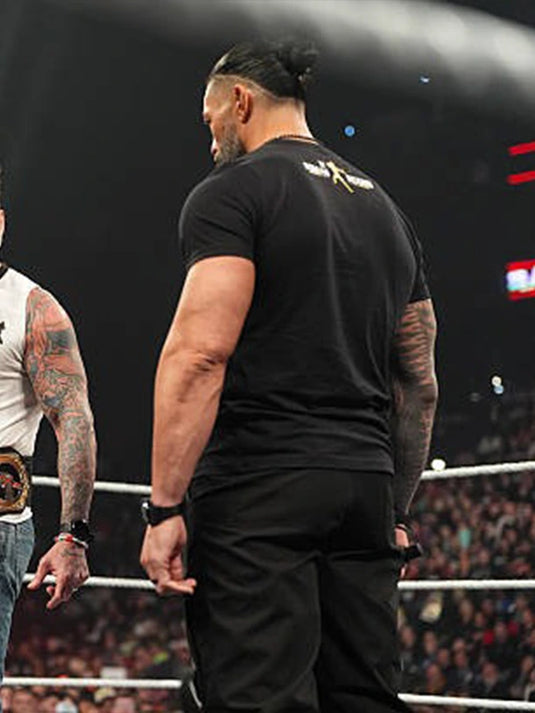 Recreated WWE RAW 2026 black crewneck t-shirt designed with Roman Reigns OTC-1 gold artwork and smooth cotton material.