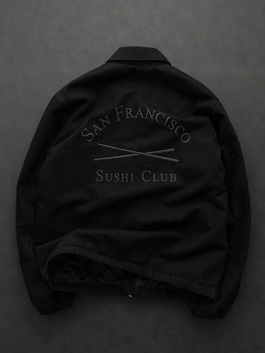 Black oversized denim jacket from Gap × Sushi Club featuring dropped shoulders and streetwear silhouette