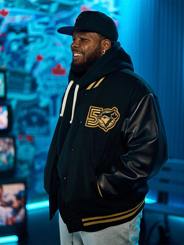 RECREATED Roots Toronto Blue Jays 50th Anniversary Merch Black Varsity Jacket featuring a classic varsity silhouette with premium outerwear construction