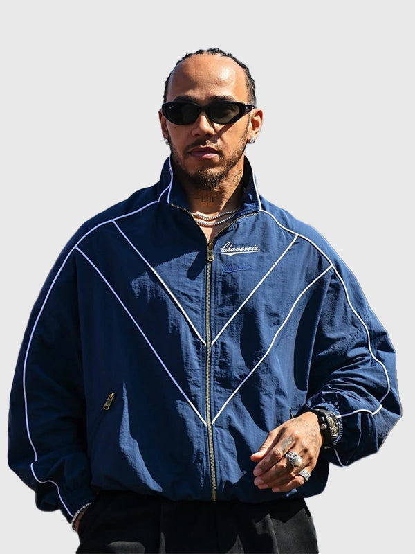 Lewis Hamilton 2026 Willy Chavarria track jacket in blue combining smooth fabric and contemporary sport-inspired style