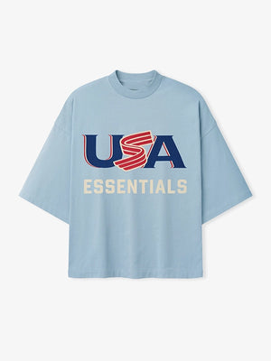 RECREATED Essentials Fear of God 2026 USA Baseball Merch T-Shirt in Blue featuring smooth cotton fabric with a bold sporty casual look
