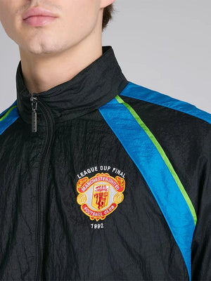 Adidas Manchester United 2026 Track Jacket with Bringback 90/92 design elements and modern streetwear finish