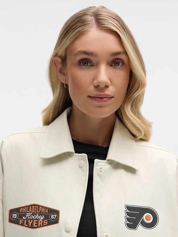 Cream lululemon jacket recreated from the Philadelphia Flyers Coach’s design with functional button closure