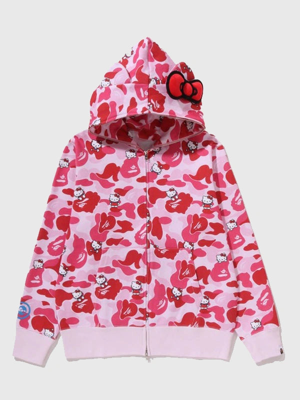 Recreated A Bathing Ape Hello Kitty full zip fleece hoodie in pink showcasing signature camo pattern and soft feel