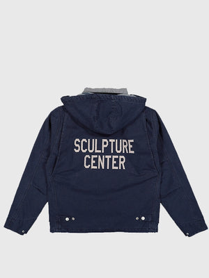 Recreated Carhartt WIP x New Balance Arcan jacket in navy featuring a structured hooded design