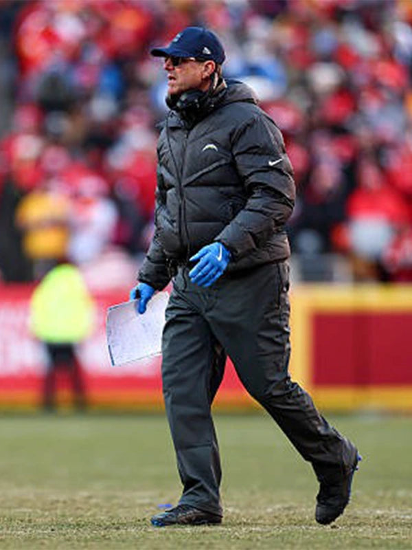 Black Nike parachute puffer jacket inspired by Coach Jim Harbaugh for the 2025 Los Angeles Chargers season