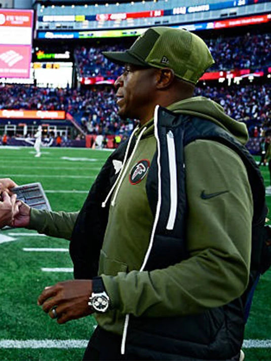 Olive Green Atlanta Falcons 2025 Fleece Hoodie modeled after Coach Raheem Morris’s sideline outfit.