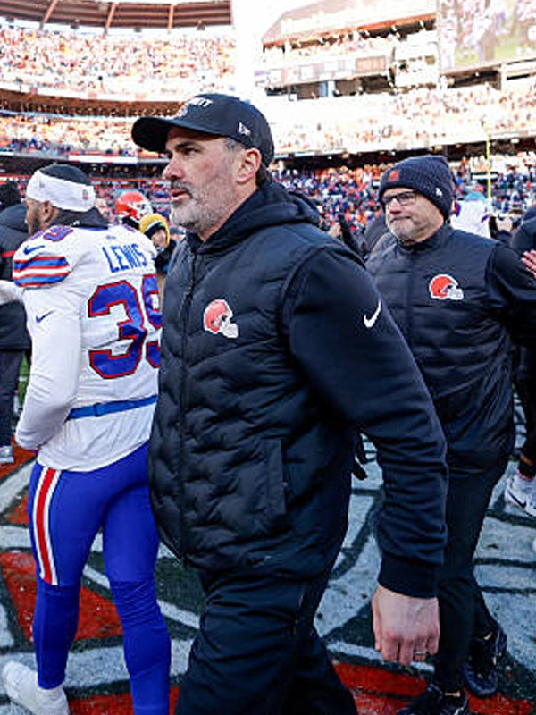 Black parachute puffer vest inspired by Cleveland Browns sideline style worn by coach Kevin Stefanski