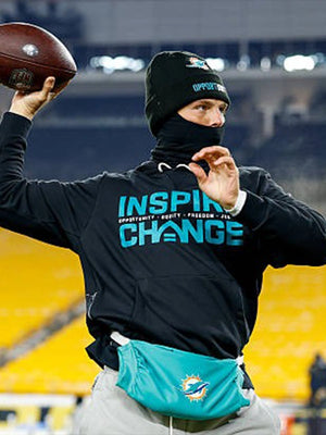Miami Dolphins 2025 Inspire Change hoodie in black designed by Nike with modern fit and impactful text